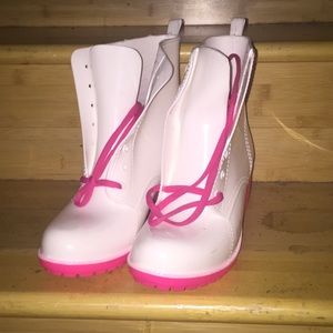 White and pink jelly rain shoes